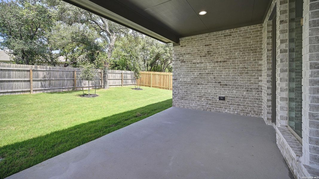Exterior details and patio area of a home in Kallison Ranch, San Antonio (Image 23).