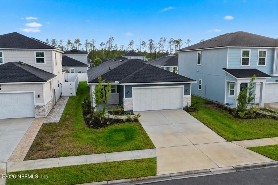 Front exterior of a new home in , St. Augustine, FL, highlighting curb appeal (Image 26).