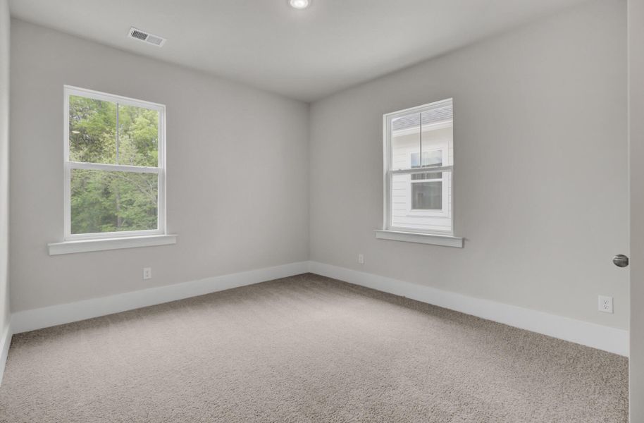 Spacious, unfurnished interior of a new home in Indigo Grove Single Family Homes, Johns Island (Image 47). Spacious, unfurnished interior of a new home in Indigo Grove Single Family Homes, Johns Island (Image 47).