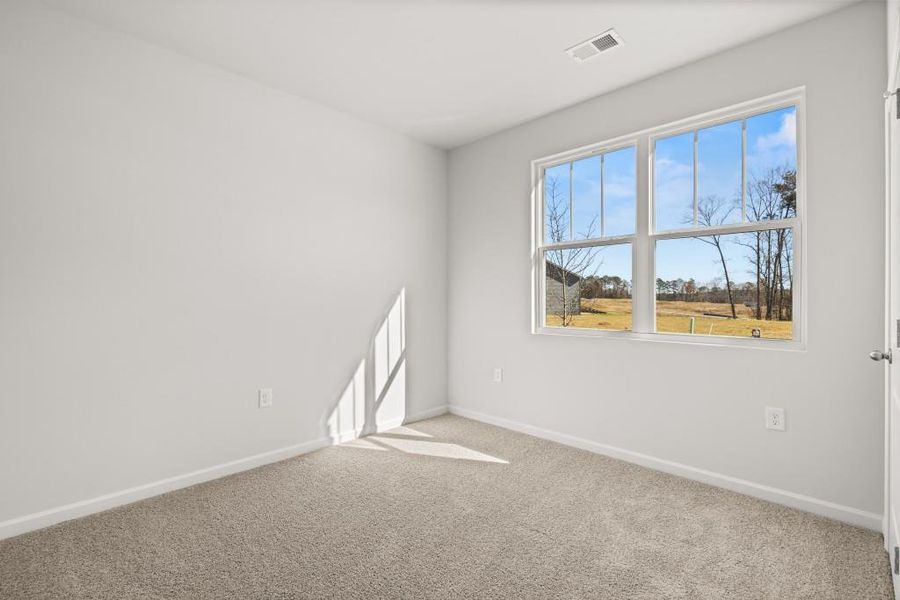 Spacious, unfurnished interior of a new home in Northwoods at Mirror Lake, Villa Rica (Image 25).