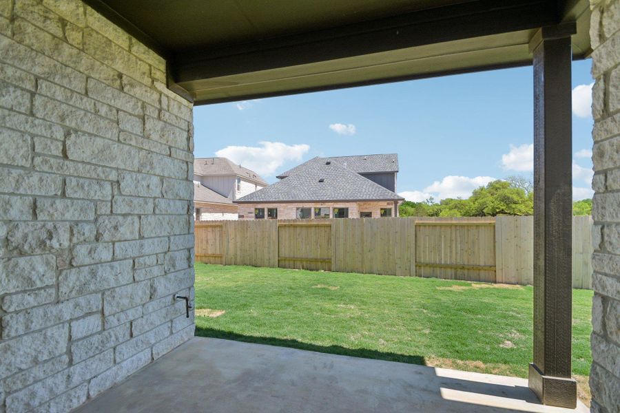 Exterior details and patio area of a home in Persimmon, Buda (Image 21).