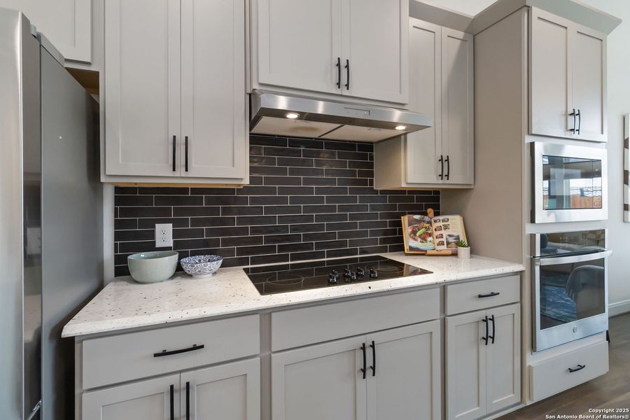 Furnished interior view inside a new home in Woodbridge Farms, La Vernia (Image 4).