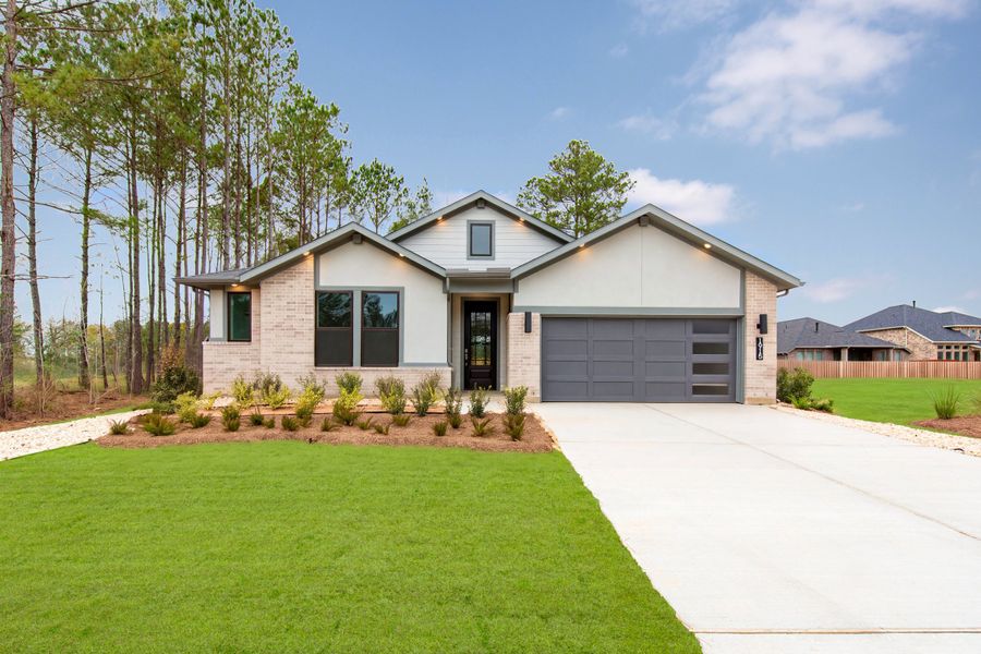 Front exterior of a new home in COLTON, Montgomery, TX, highlighting curb appeal (Image 1). Front exterior of a new home in COLTON, Montgomery, TX, highlighting curb appeal (Image 1).