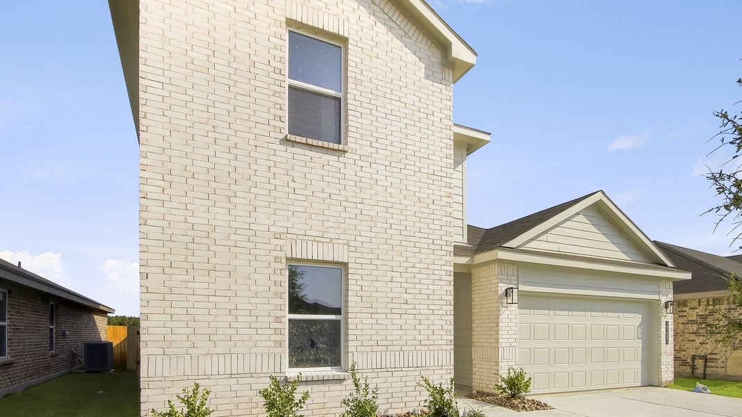 Exterior details and patio area of a home in Porters Mill, New Caney (Image 2). Exterior details and patio area of a home in Porters Mill, New Caney (Image 2).