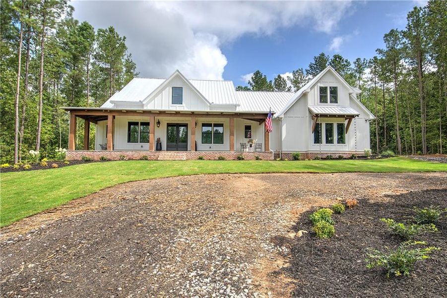 Front exterior of a new home in , Temple, GA, highlighting curb appeal (Image 24).