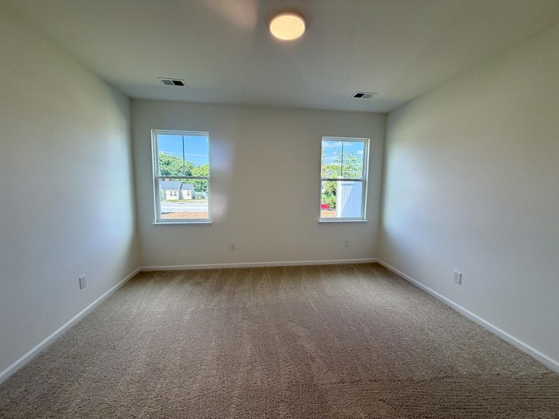 Spacious, unfurnished interior of a new home in Bellevue Townhomes, Greenville (Image 14).