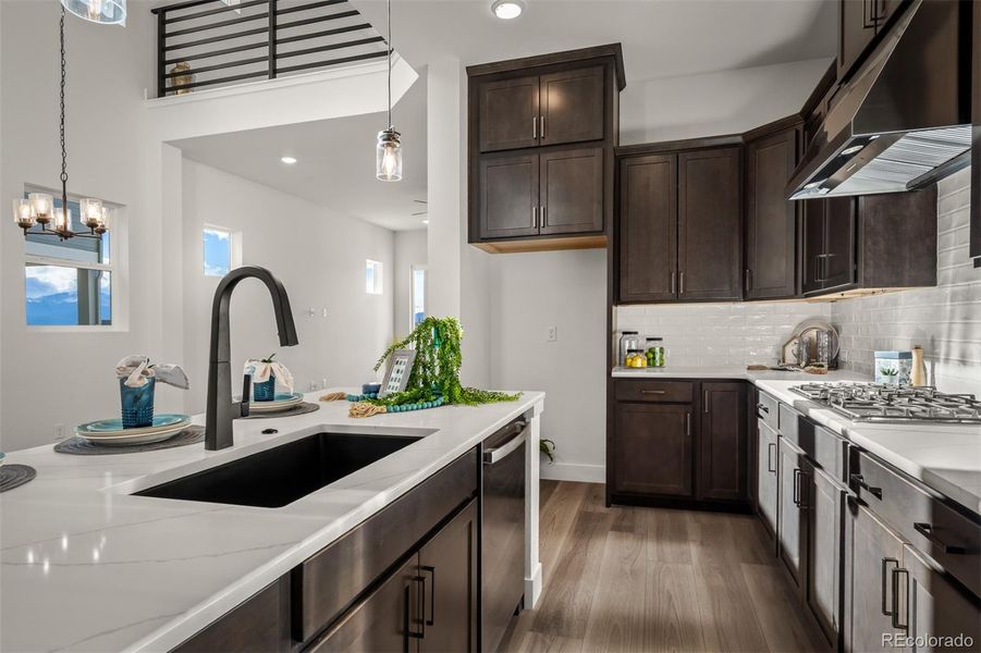Furnished interior view inside a new home in Revel Crossing at Wolf Ranch - The Panorama Collection, Colorado Springs (Image 13).
