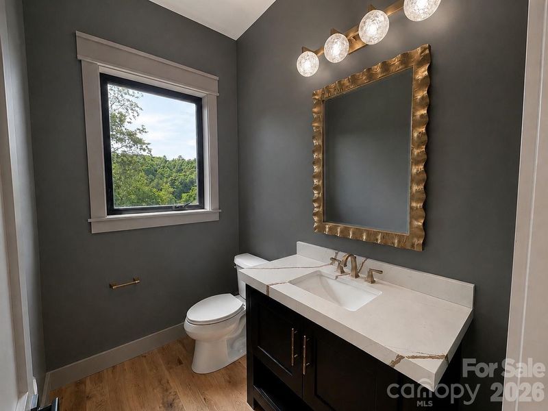 Designer powder room featuring premium finishes and statement lighting