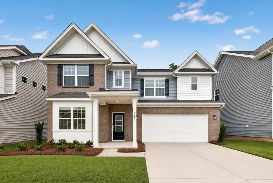 Front exterior of a new home in Pine Oaks Estates, Gilbert, SC, highlighting curb appeal (Image 1). Front exterior of a new home in Pine Oaks Estates, Gilbert, SC, highlighting curb appeal (Image 1).