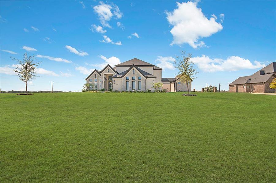 View of front facade featuring a front yard View of front facade featuring a front yard