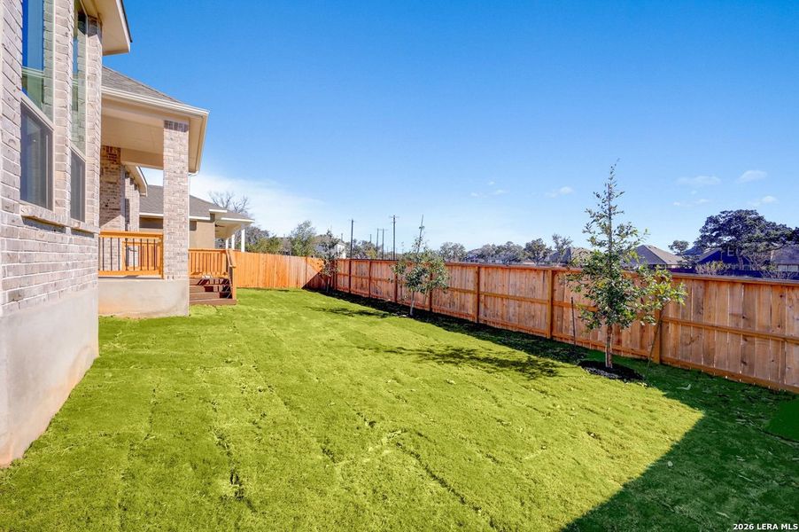 Exterior details and patio area of a home in Davis Ranch, San Antonio (Image 18).