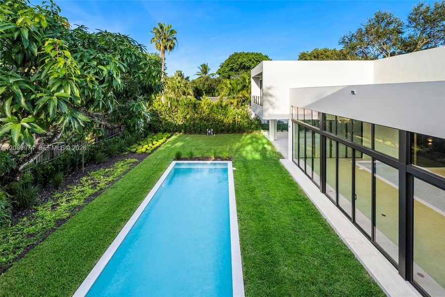 Exterior details and patio area of a home in , South Miami (Image 40).