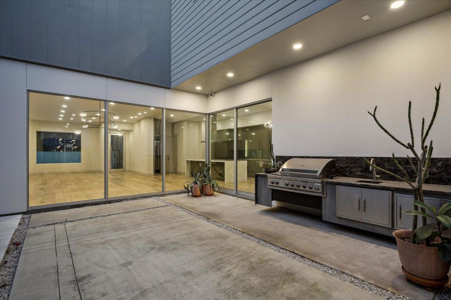 Exterior details and patio area of a home in , Houston (Image 2).