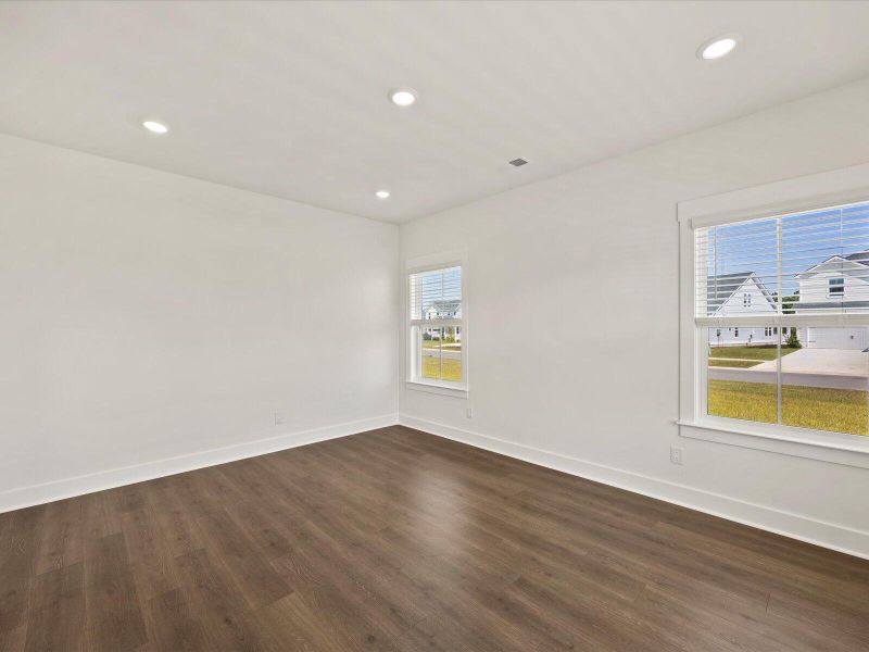 Spacious, unfurnished interior of a new home in The Coves at Lakes of Cane Bay, Summerville (Image 10). Spacious, unfurnished interior of a new home in The Coves at Lakes of Cane Bay, Summerville (Image 10).