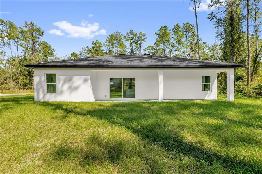 Exterior details and patio area of a home in , Citrus Springs (Image 20).