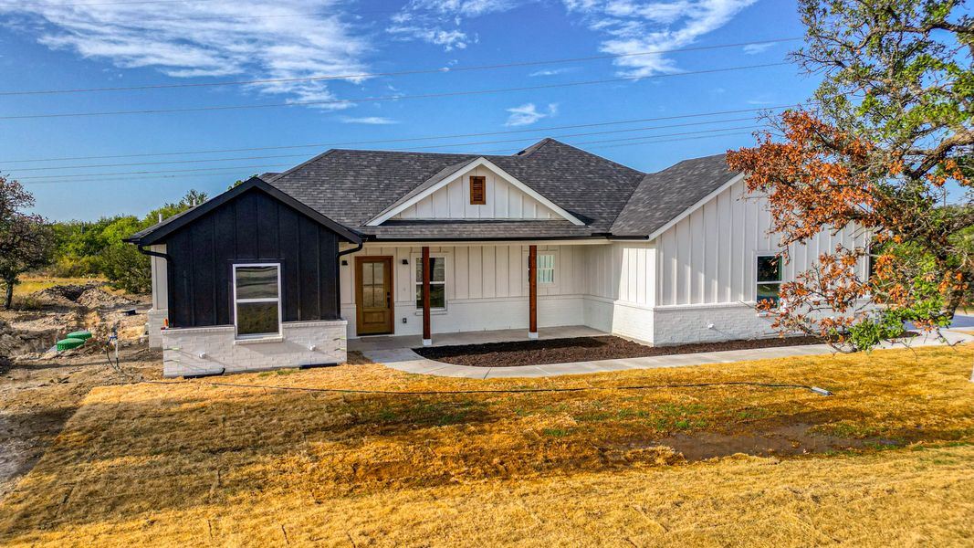 Representative exterior photo of a completed home built from the Lucas by Zeal Home Builders in Echo Grove, Poolville, TX (Image 38).