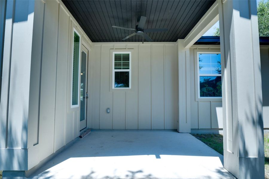 Property entrance featuring ceiling fan