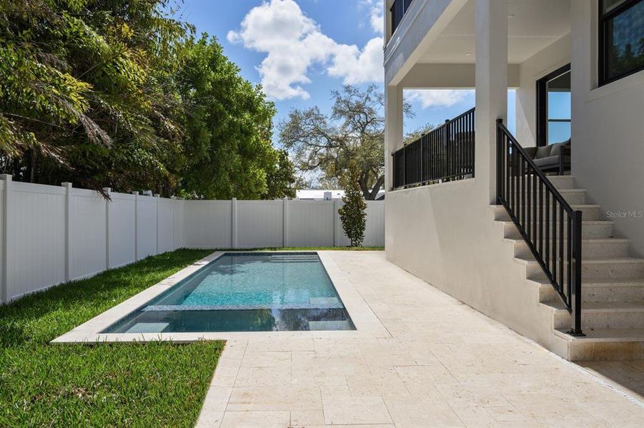 Exterior details and patio area of a home in City Homes - South Tampa, Tampa (Image 20).