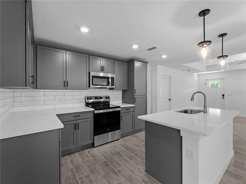 Furnished interior view inside a new home in , Port Charlotte (Image 5). Furnished interior view inside a new home in , Port Charlotte (Image 5).