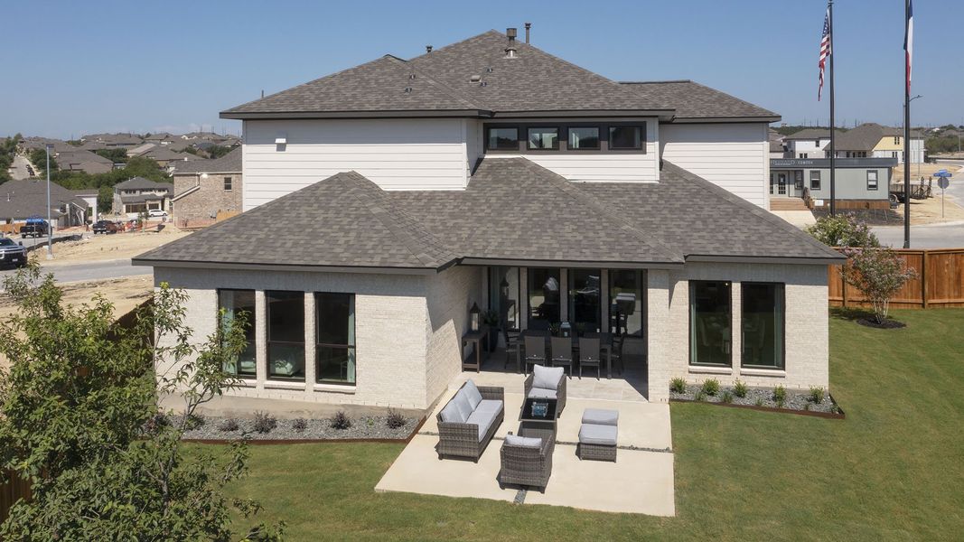 Front exterior of a new home in Weston Oaks 55', San Antonio, TX, highlighting curb appeal (Image 16). Front exterior of a new home in Weston Oaks 55', San Antonio, TX, highlighting curb appeal (Image 16).