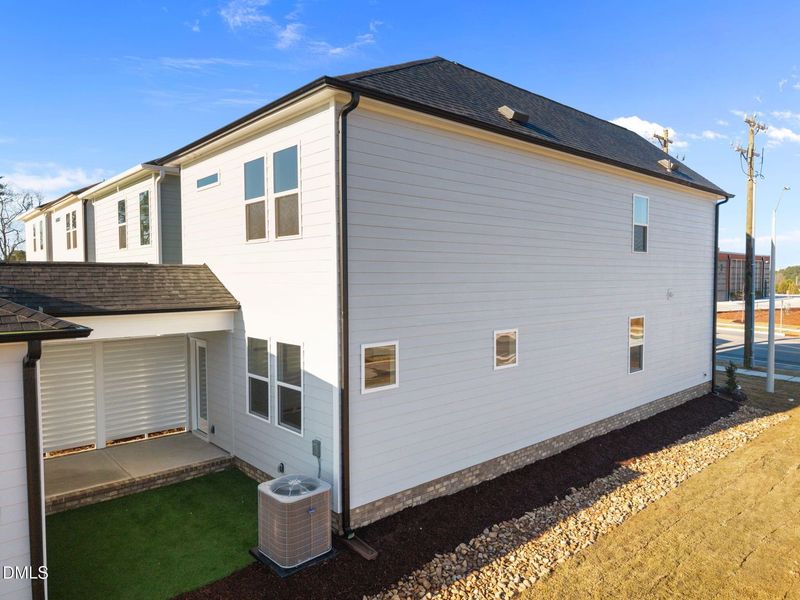 Exterior details and patio area of a home in Forestville Yard, Knightdale (Image 19).