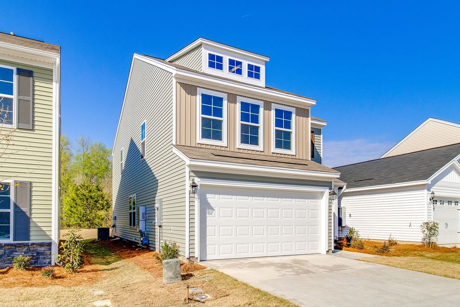 Front exterior of a new home in Bluefield, Lexington, SC, highlighting curb appeal (Image 19).