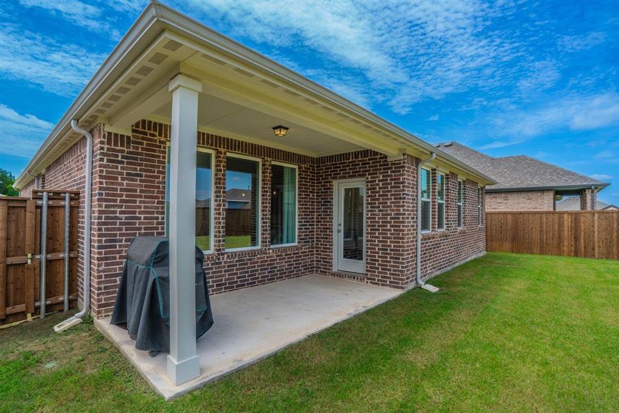 Exterior details and patio area of a home in Devonshire, Forney (Image 3). Exterior details and patio area of a home in Devonshire, Forney (Image 3).