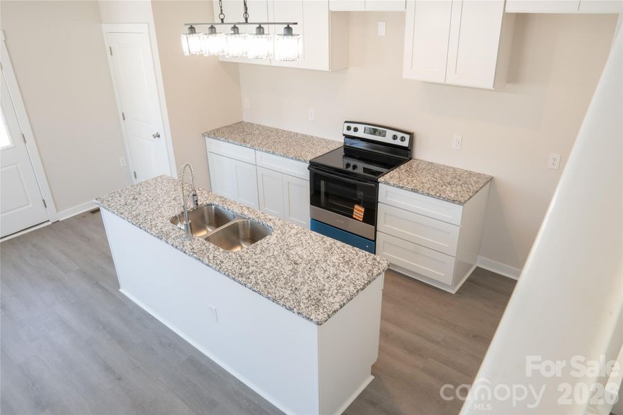 Furnished interior view inside a new home in , Statesville (Image 4).