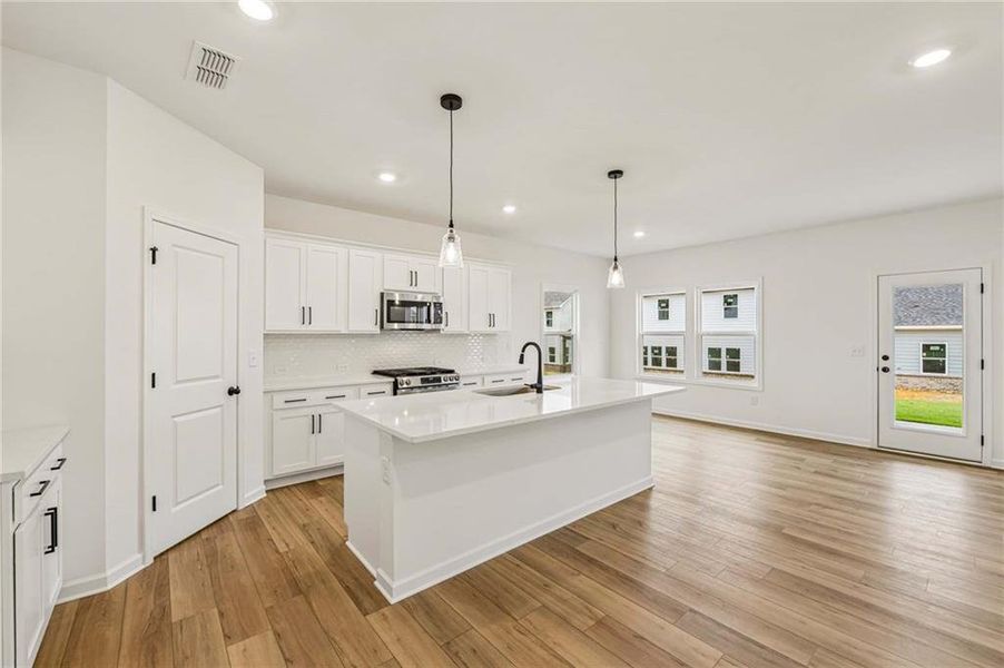 Furnished interior view inside a new home in Eastlyn Crossing, Flowery Branch (Image 7).