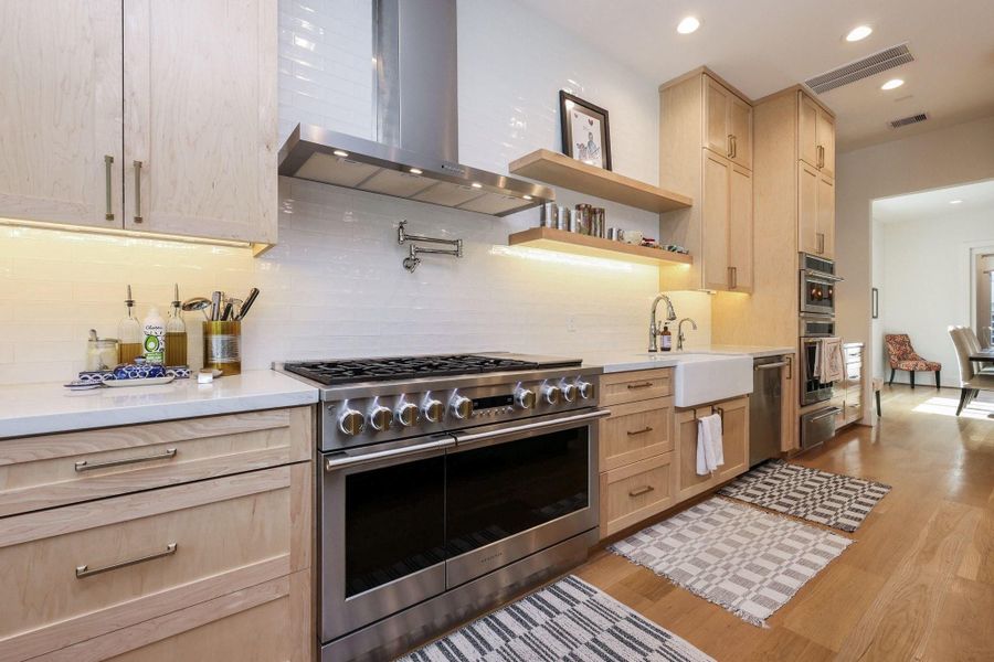 Similar floorplan with finished kitchen to give you an idea of what 4002 Marquette will look like.