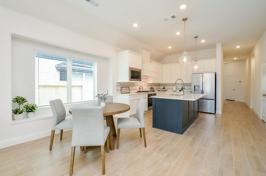 Combined kitchen and dining area.