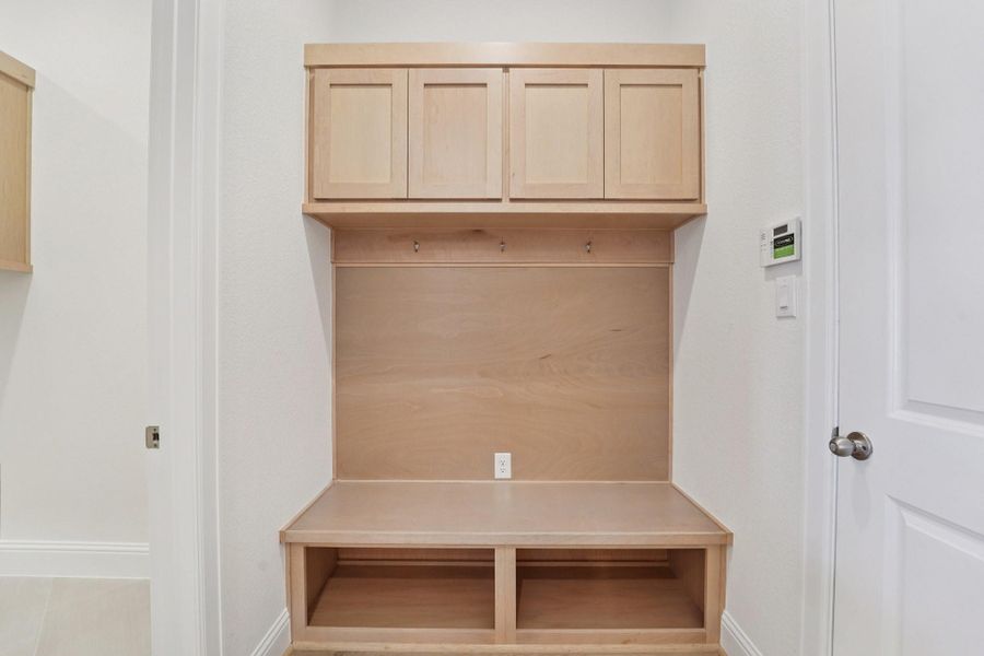 Furnished interior view inside a new home in Meridiana 70', Manvel (Image 6).