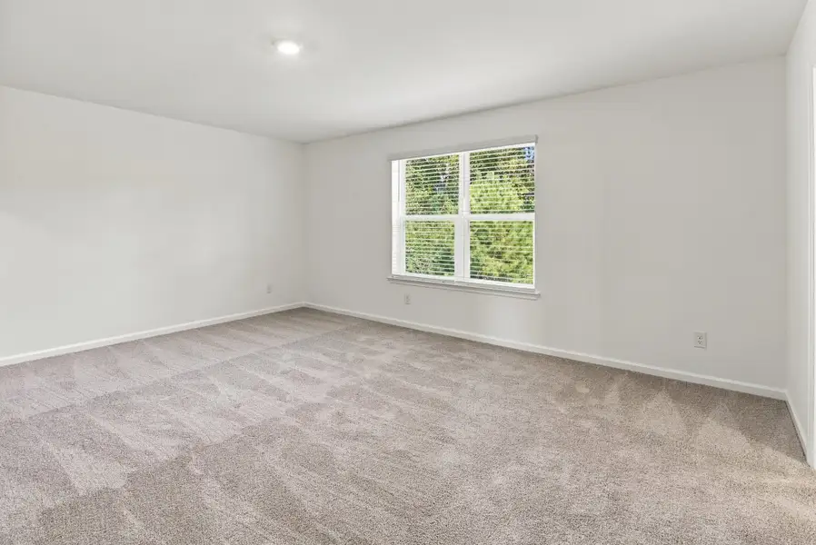 Spacious, unfurnished interior of a new home in The Groves of Berkeley, Moncks Corner (Image 33).