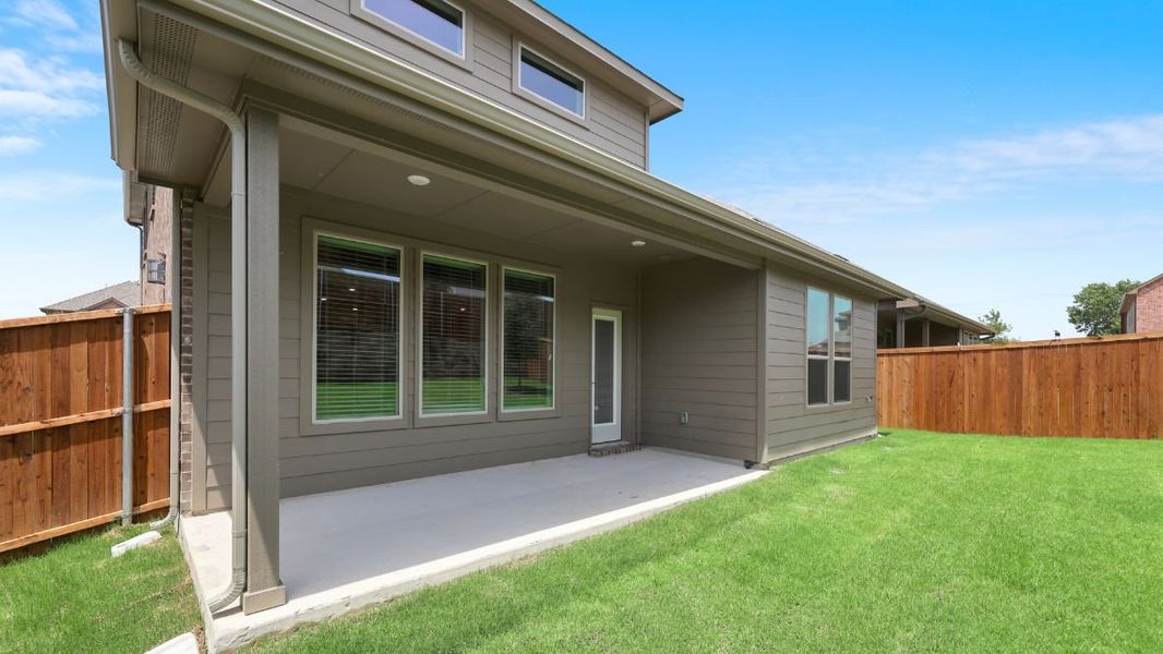 Representative exterior photo of a completed home built from the Burrow by D.R. Horton in The Landing at Hidden Lakes, McKinney, TX (Image 20).