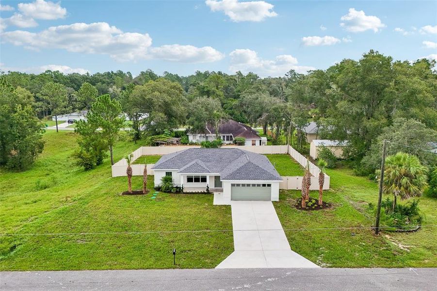 Front exterior of a new home in , Citrus Springs, FL, highlighting curb appeal (Image 26).