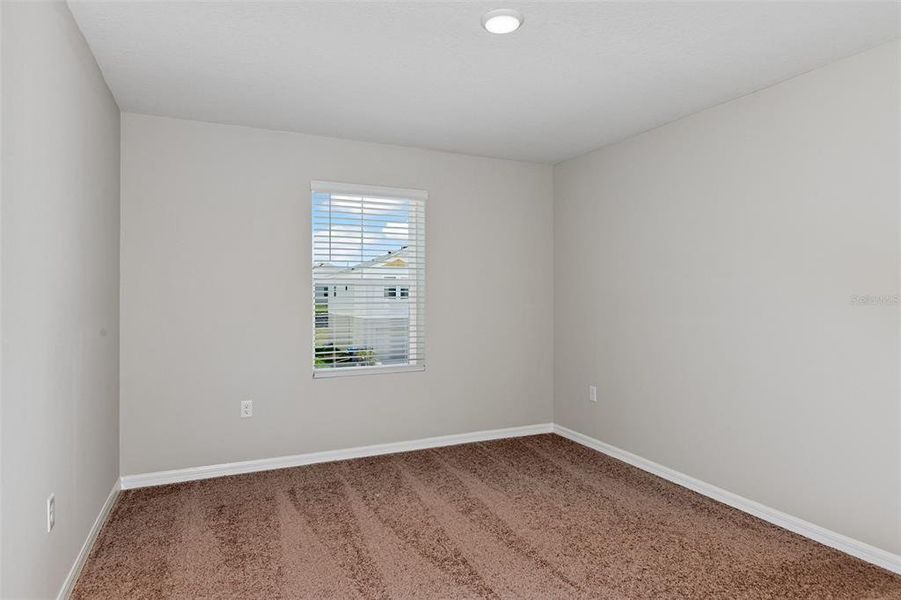 Spacious, unfurnished interior of a new home in Pasadena Landing, Wesley Chapel (Image 19).