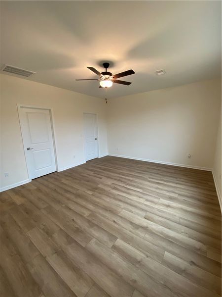 Spacious, unfurnished interior of a new home in Springwood Grove, Central (Image 15).