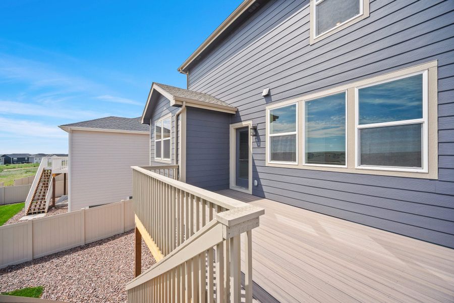 Front exterior of a new home in Trails at Aspen Ridge-3, Colorado Springs, CO, highlighting curb appeal (Image 24).