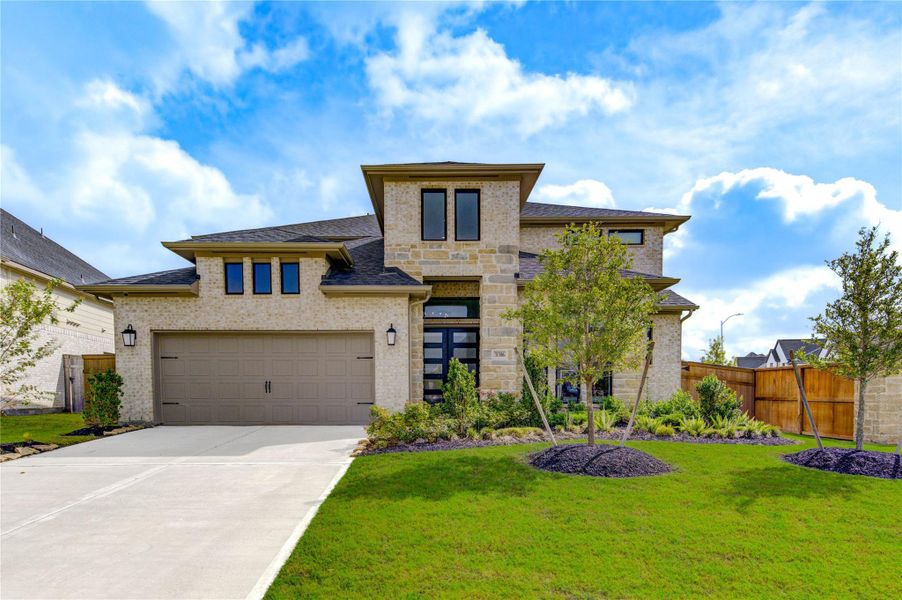 Front exterior of a new home in , Fulshear, TX, highlighting curb appeal (Image 2). Front exterior of a new home in , Fulshear, TX, highlighting curb appeal (Image 2).