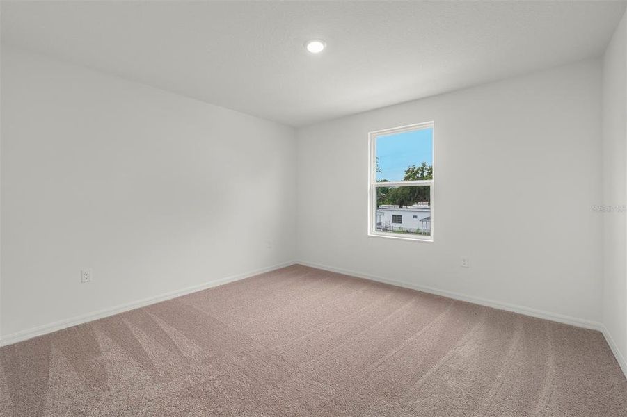 Spacious, unfurnished interior of a new home in Tula Parc, Astatula (Image 16).