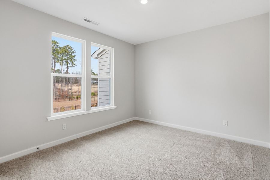 Spacious, unfurnished interior of a new home in Ovation at Sweetbrier, Durham (Image 26).