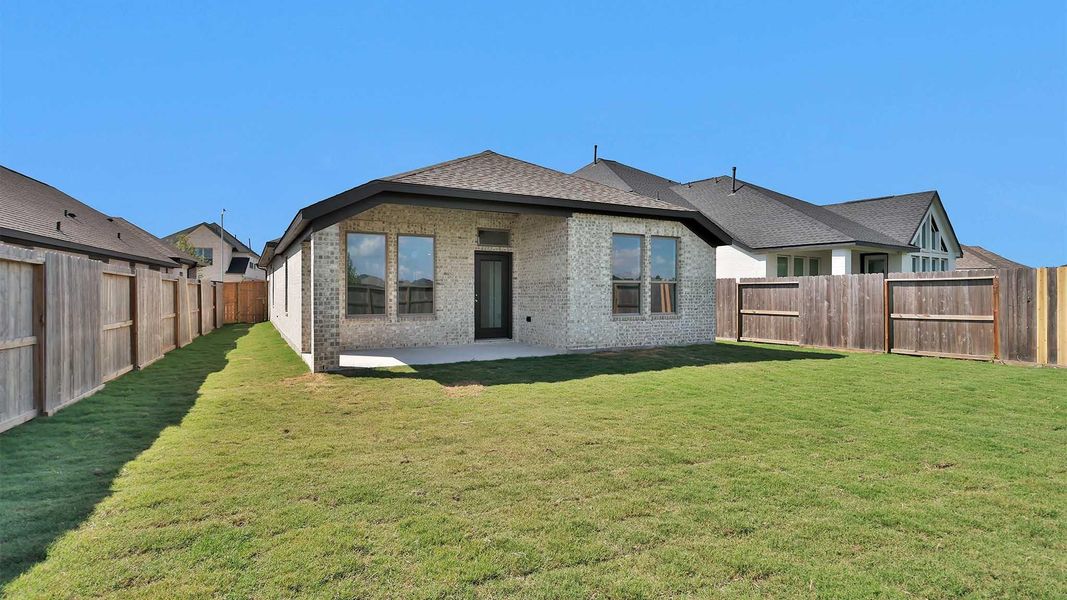 Exterior details and patio area of a home in Candela South, Richmond (Image 3).