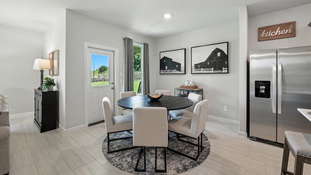 Representative furnished interior of a home built from the Natchez by D.R. Horton in The Canyons, Keene (Image 12).