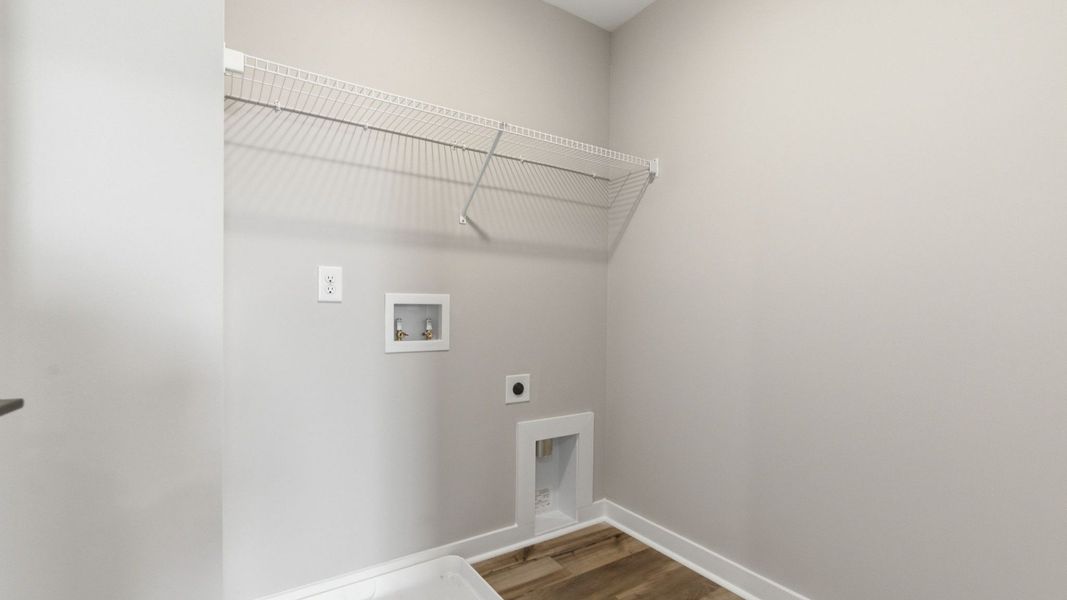 Laundry room with ventilated shelf Laundry room with ventilated shelf