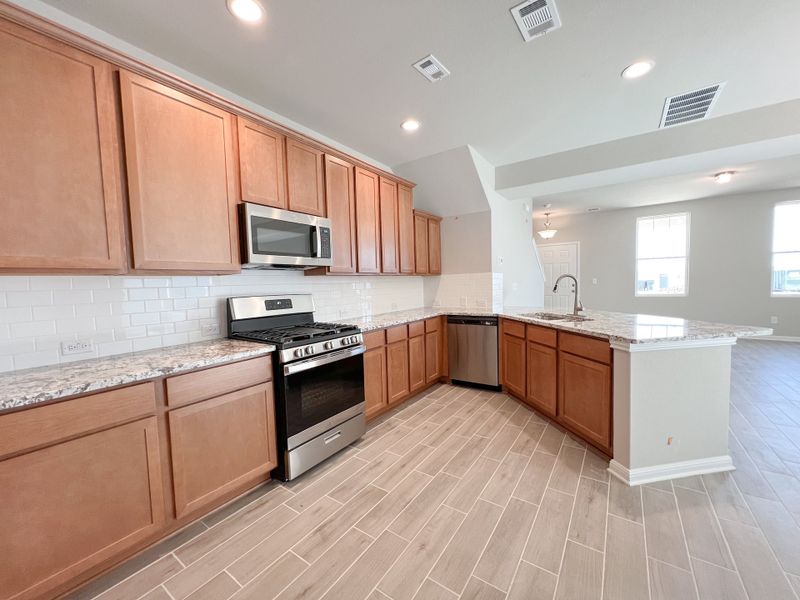Representative furnished interior of a home built from the The Laura Belle Wallace II by Bigelow Homes in Creekside, Kyle (Image 10). Representative furnished interior of a home built from the The Laura Belle Wallace II by Bigelow Homes in Creekside, Kyle (Image 10).