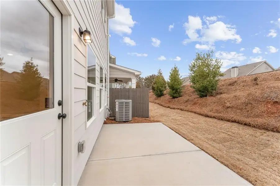 Exterior details and patio area of a home in Cherokee Township, Acworth (Image 16).