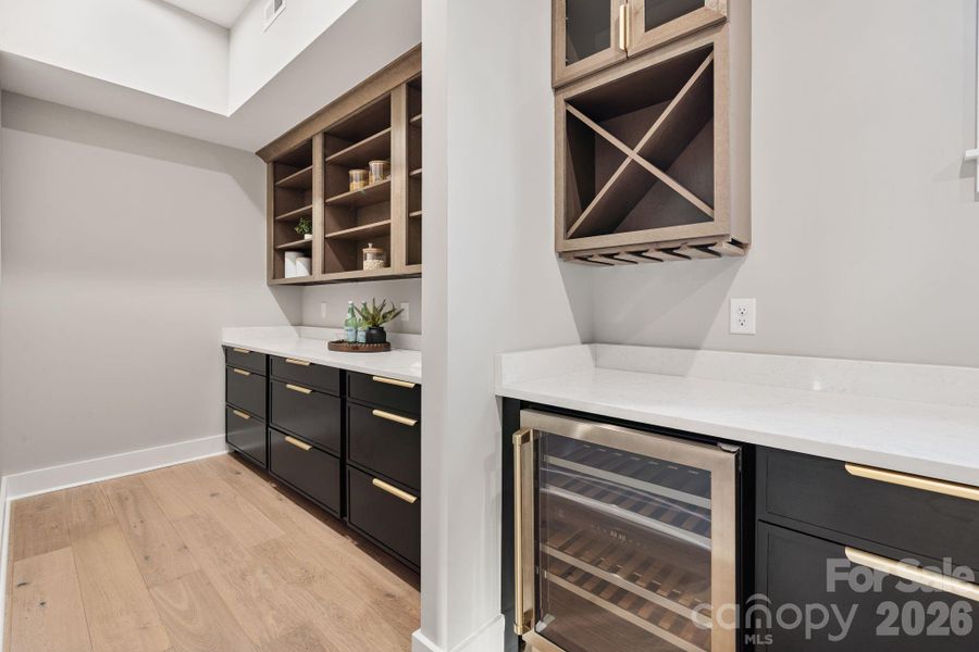 Walk-in pantry with beverage fridge
