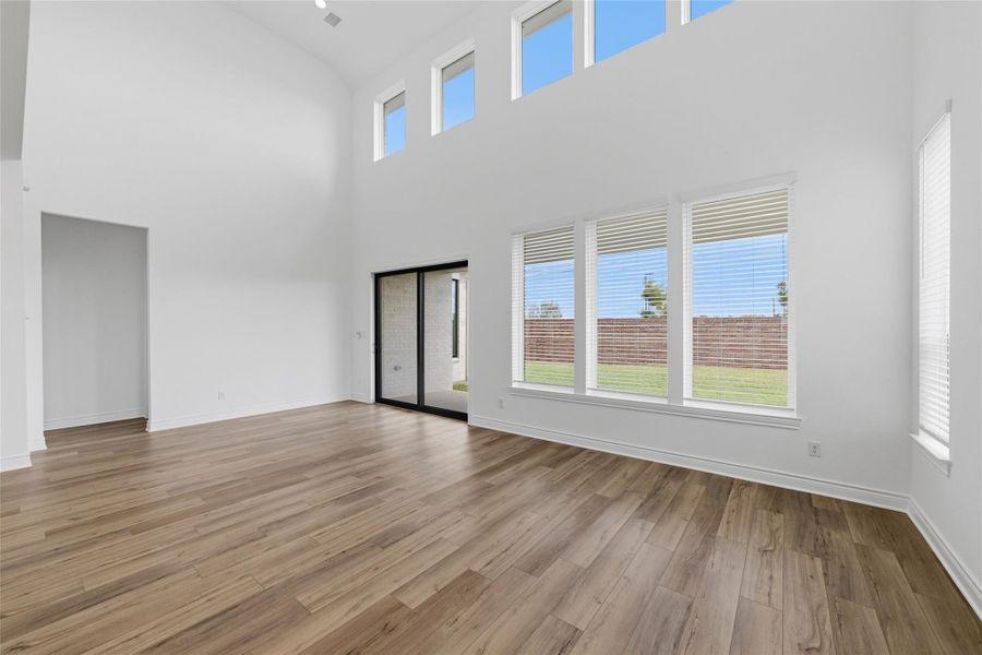 High ceilings and abundant windows fill the home with beautiful natural light, creating a bright, open, and inviting atmosphere.