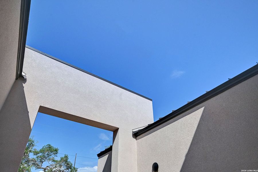 Exterior details and patio area of a home in , Fischer (Image 28).