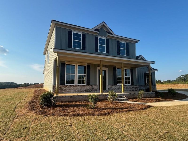 Exterior details and patio area of a home in Magnolia Ridge, Monroe (Image 4).